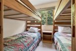 bedroom two features two twin bunks